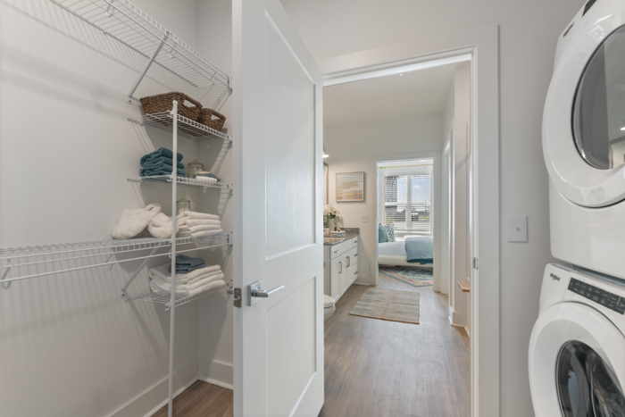 closet storage shelves with laundy