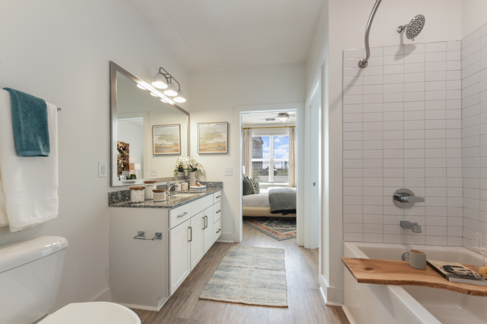 spacious bathroom with shower tub combo